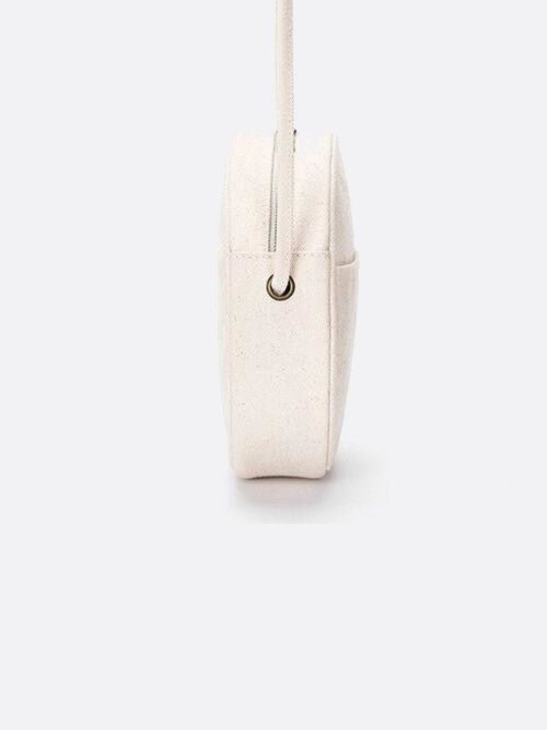Bolso bandolera redondo